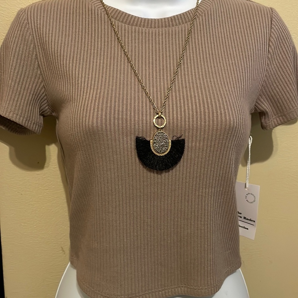 Top and necklace sold separately!